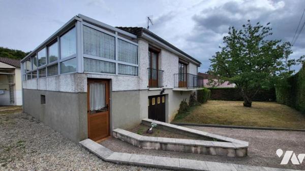 Pavillon en sortie de ville sur 484 m² avec véranda