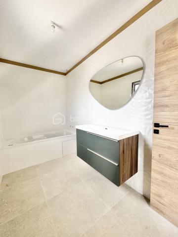 Découvrez les à Sérignan cette superbe villa neuve de 105 m² sur une parcelle de 185 m2 ,répartie sur deux niveaux, idéalement située à seulement 800 mètres de la plage, dans un environnement calme et résidentiel, à proximité des commodités et des transports.
Cette maison aux lignes modernes séduit par la qualité de ses prestations, ses finitions soignées et son agencement optimisé, pensé pour offrir un confort de vie optimal.
Au rez-de-chaussée, vous trouverez :
Une entrée avec placard intégré
Un WC suspendu avec lave-mains
Une spacieuse pièce de vie de 45 m2 lumineuse avec cuisine équipée
 Une baie vitrée de 4 mètres ouvrant sur une terrasse avec piscine
Une suite parentale avec dressing et salle d’eau
À l’étage :
Un palier desservant deux chambres de 12 m² chacune
Une salle de bain ,un WC indépendant
Une belle terrasse de 28 m², à l’abri des regards
Le garage de 19 m², entièrement carrelé et isolé, accueille un chauffe-eau thermodynamique ainsi que les branchements pour lave-linge et sèche-linge.
Conforme aux normes RE2020, la villa est équipée de prestations modernes :
Menuiseries aluminium double vitrage,Volets roulants électriques
Climatisation gainable
Chauffe-eau thermodynamique
Prises RJ45 dans le séjour et les chambres
Vous serez immédiatement séduit par ses volumes généreux, sa luminosité et ses prestations de qualité.
Une opportunité rare à ne pas manquer – contactez-nous pour organiser une visite !