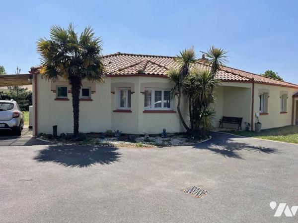 Maison de plain-pied 4 chambres + 1 studio + 1 garage