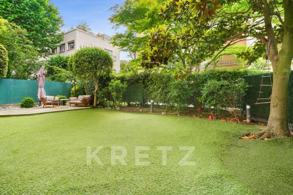 Appartement familial baigné de soleil sur jardin à Neuilly