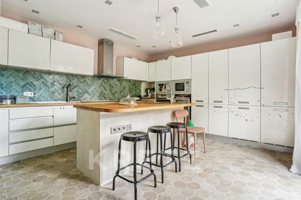 Appartement familial baigné de soleil sur jardin à Neuilly