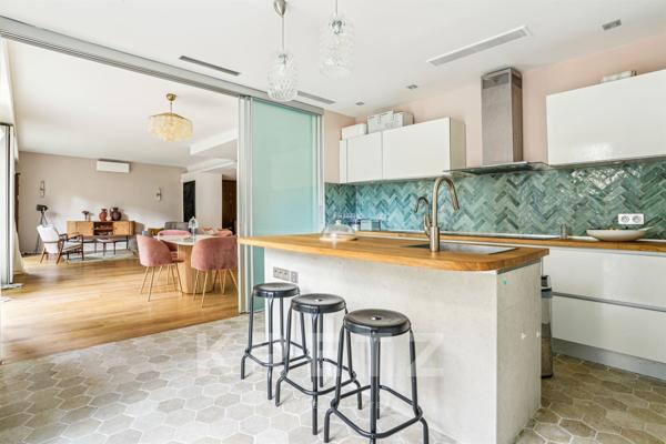 Appartement familial baigné de soleil sur jardin à Neuilly