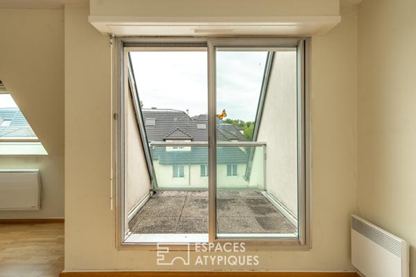 Duplex au dernier étage avec terrasses privatives début Robertsau