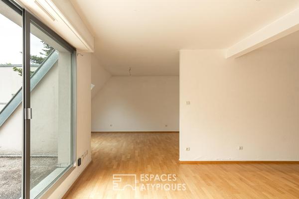 Duplex au dernier étage avec terrasses privatives début Robertsau