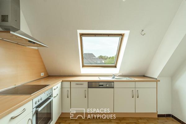 Duplex au dernier étage avec terrasses privatives début Robertsau