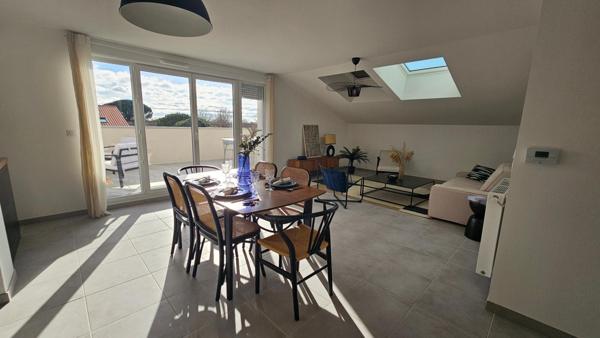 Appartement T5 avec grande terrasse et 3 places de parking