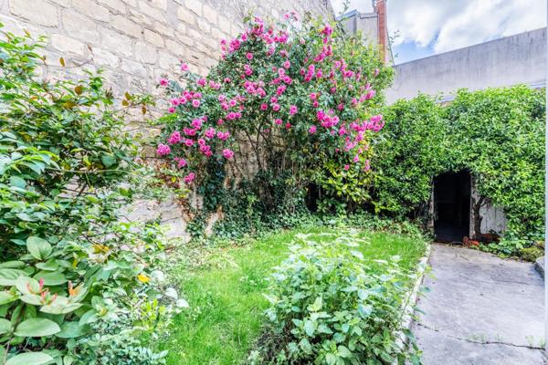 Belle maison familiale de 130m², 4 chambres, quartier recherché proche du centre-ville.