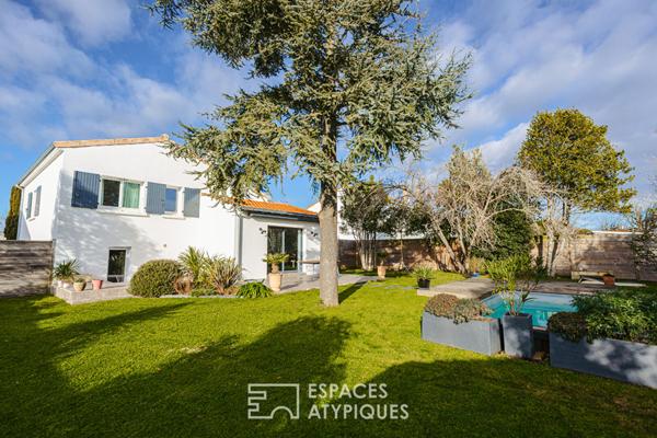 Maison familiale à Lagord dans un écrin de verdure avec piscine