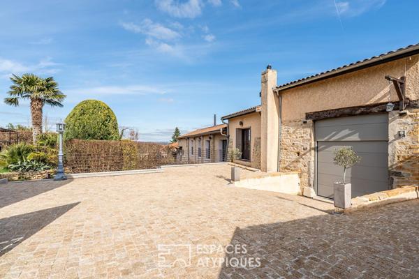 Ancien cuvage de 1850 à la rénovation contemporaine avec dépendances et piscine