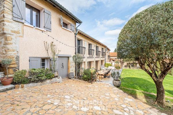 Ancien cuvage de 1850 à la rénovation contemporaine avec dépendances et piscine
