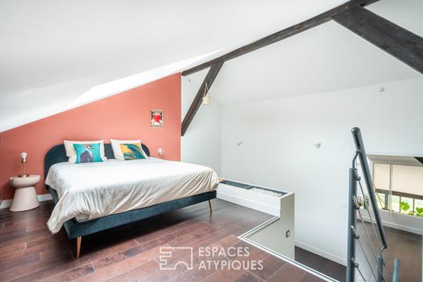 Loft traversant avec verrière et terrasse