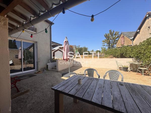 Maison familiale avec jardin à Parigné-l'évêque.