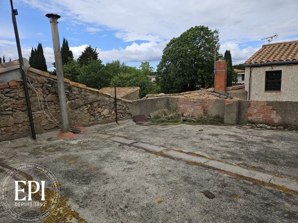 Maison de village avec terrasse à rénover