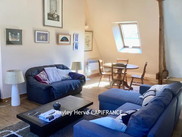 Immeuble à vendre à Mortain (50) – Local commercial et appartement avec garage