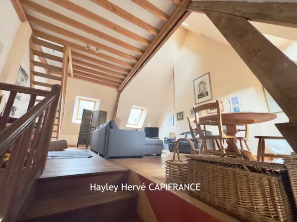 Immeuble à vendre à Mortain (50) – Local commercial et appartement avec garage