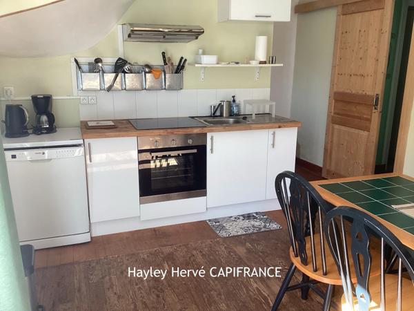 Immeuble à vendre à Mortain (50) – Local commercial et appartement avec garage