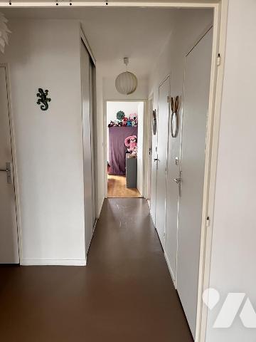 Appartement de type 3 avec terrasse, cave et garage. Locataire en place.