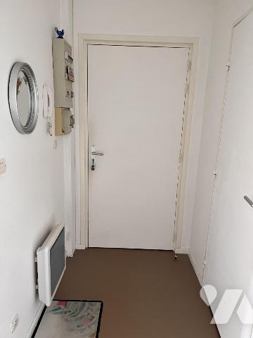 Appartement de type 3 avec terrasse, cave et garage. Locataire en place.