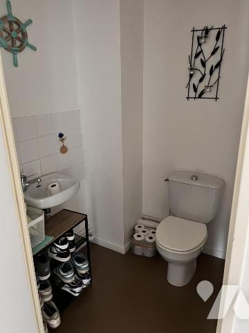 Appartement de type 3 avec terrasse, cave et garage. Locataire en place.