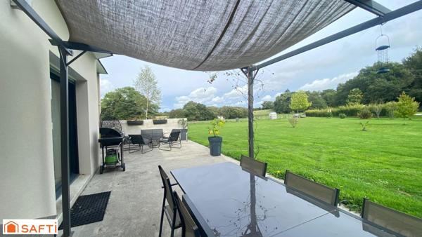 Maison récente dans un cadre verdoyant