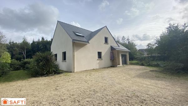 Maison récente dans un cadre verdoyant