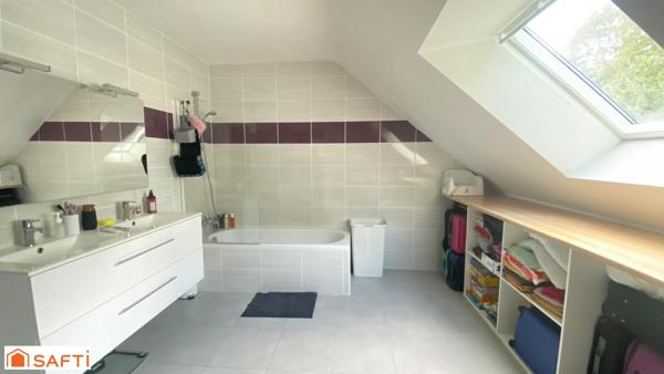 Maison récente dans un cadre verdoyant