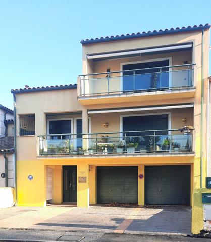 Appartement rénové avec terrasse et garage