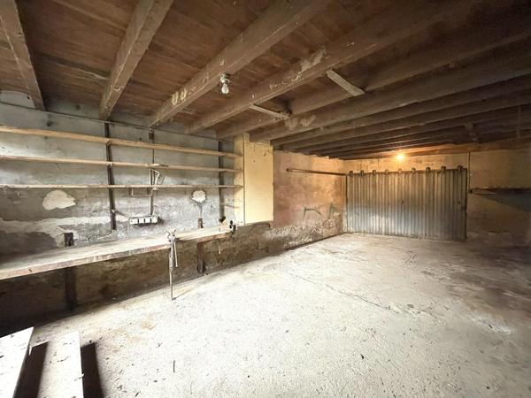 Maison de village avec jardin et grand garage