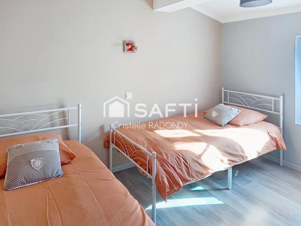 IMMEUBLE AVEC 3 APPARTEMENTS AU PIED DE LA CITE DE CARCASSONNE