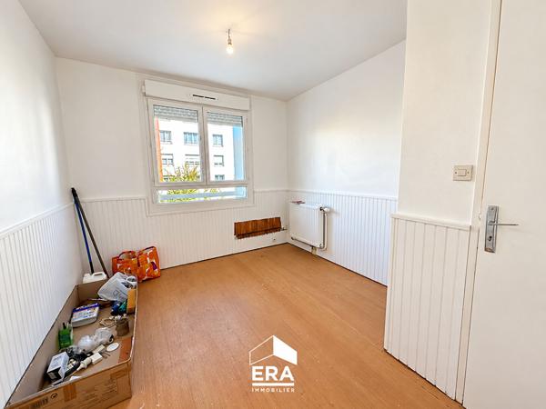 Appartement T3 pièce(s) 51 m2 + Cave + Parking à rénover