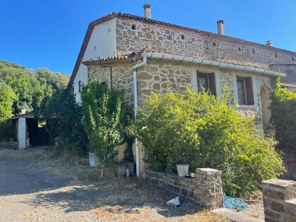 Mas en pierres mitoyen proche Anduze sur terrain constructible de 3300 m2