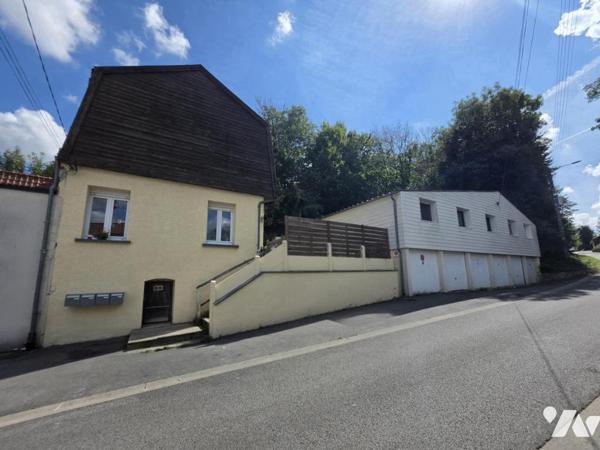 Immeuble de rapport composé de 2 T3 + 2 T4 + 5 garages