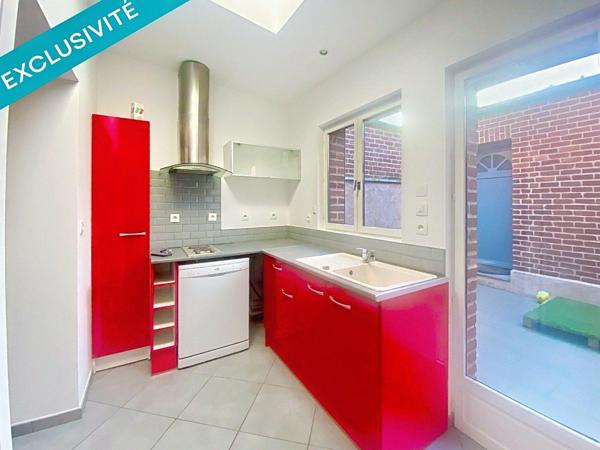 MAISON SEMI-INDIVIDUELLE AVEC COUR ET GARAGE