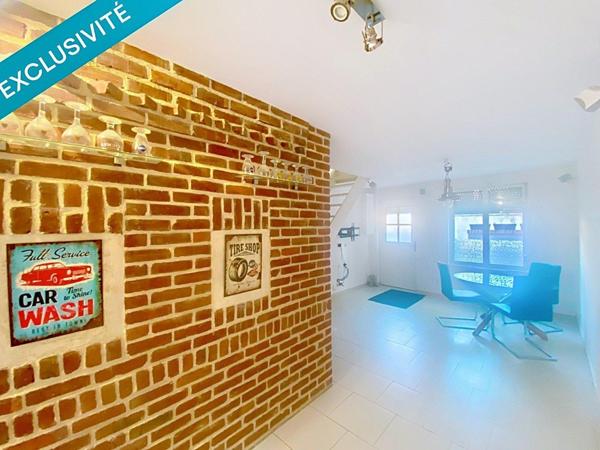 MAISON SEMI-INDIVIDUELLE AVEC COUR ET GARAGE