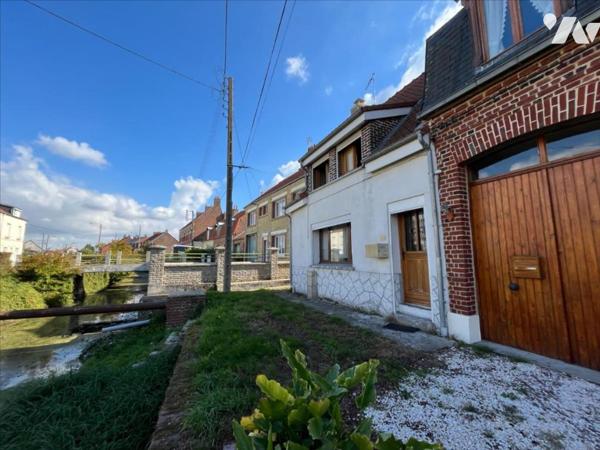MAISON SEMI-MITOYENNE A RENOVER