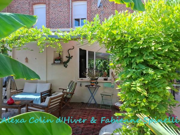 Maison rénovée offrant vie de plain pieds et bel extérieur à BELLEU