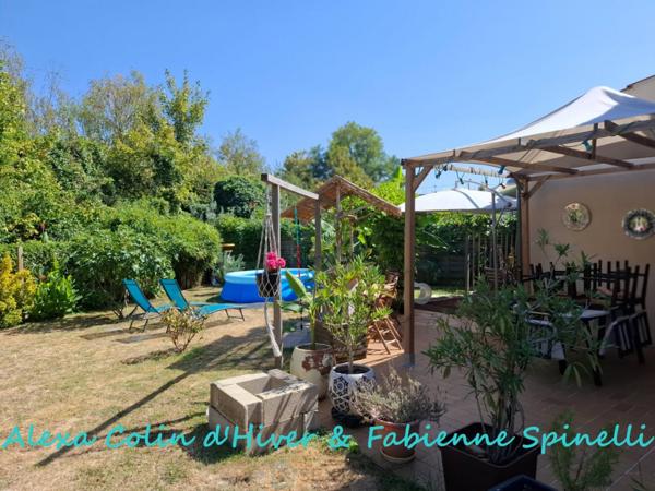 Maison rénovée offrant vie de plain pieds et bel extérieur à BELLEU