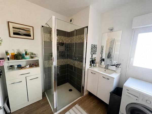 THEIX-NOYALO - Appartement T3 de 65 m² avec jardin privatif, terrasse, garage et cave