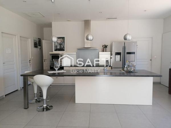 Maison plain pied, vue dégagée en face d'une zone natura 2000 et prés des commodités