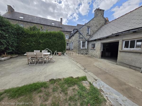 Au cœur du bourg, cette maison en pierre mitoyenne d’un côté offre une belle surface habitable, de nombreux espaces et un potentiel intéressant pour qui souhaite lui redonner une nouvelle vie.
Le rez-de-chaussée s’organise autour d’une entrée desservant une cuisine, une salle à manger, un salon, ainsi qu’une chambre avec point d’eau. Un dégagement mène également à un WC indépendant avec lavabo.
À l’étage, le palier dessert quatre chambres, une salle de bains, une salle d’eau et un second WC indépendant. Au-dessus, un grenier d’environ 35 m² vient compléter l’ensemble et offre une possibilité supplémentaire d’aménagement.
La maison a conservé son intérieur d’origine et nécessite aujourd’hui une rénovation et une remise au goût du jour, notamment pour la cuisine, les pièces d’eau, l’électricité et l’isolation. Le chauffage central au fioul est actuellement fonctionnel et l’installation dessert l’ensemble de la maison. 
À l’extérieur, les dépendances apportent un véritable atout avec une grange d’environ 65 m², une cave de 11,35 m², ainsi qu’un garage d’environ 30 m². Un cabanon, une terrasse et un jardin complètent la propriété, le tout sur un terrain d’environ 796 m².
Une maison qui offre avant tout une belle base et un véritable potentiel de transformation : les volumes sont là, les dépendances aussi, et les futurs propriétaires pourront progressivement la réinventer pour créer un intérieur à leur image.
Un bien à découvrir pour celles et ceux qui recherchent le charme de la pierre, de l’espace et un projet de rénovation à personnaliser.