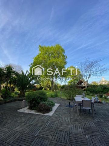 Belle maison type longère et son jardin paysagé