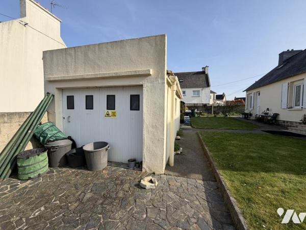 2394 - MAISON DE PLAIN PIED AVEC DEUX CHAMBRES - JARDIN DE 522M² AVEC GARAGE