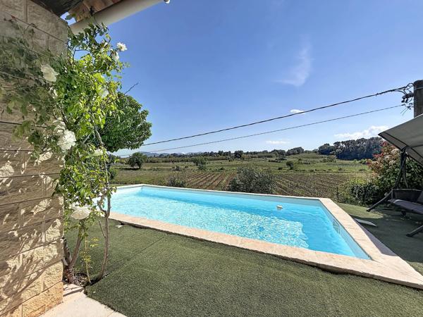 Jolie maison avec piscine et garage