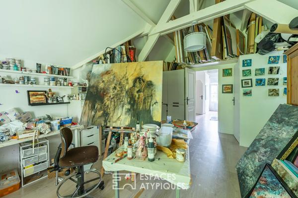 Appartement au coeur d’un ancien moulin rénové et dans un parc arboré.