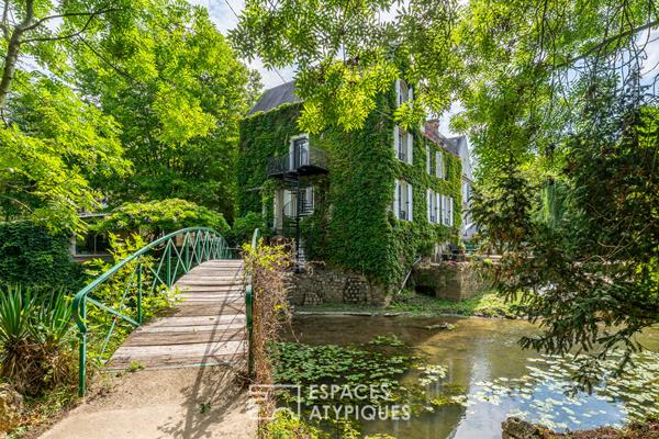 Appartement au coeur d’un ancien moulin rénové et dans un parc arboré.