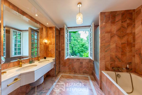 Appartement au coeur d’un ancien moulin rénové et dans un parc arboré.