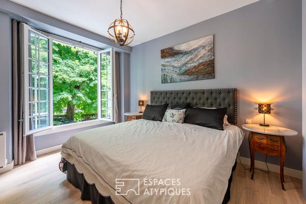 Appartement au coeur d’un ancien moulin rénové et dans un parc arboré.