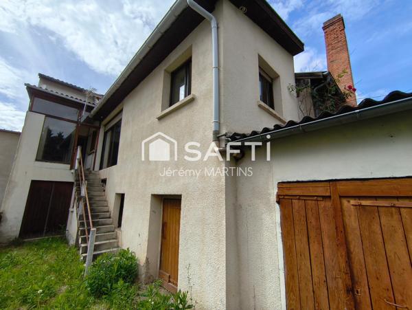 Maison de ville avec garage et jardin