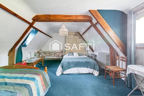 Maison avec vie de plain pied avec parc arboré et piscine chauffée