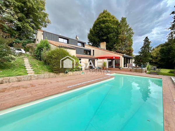 Maison avec étang en plein centre de Dompierre